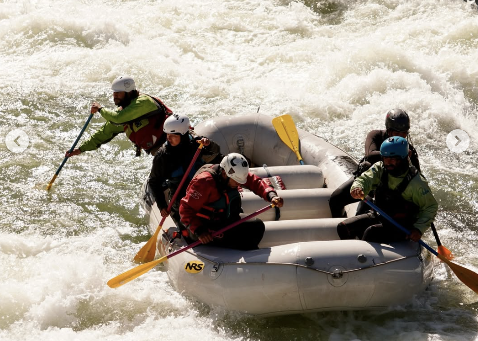 ChileRíos instructors in a rafting boat